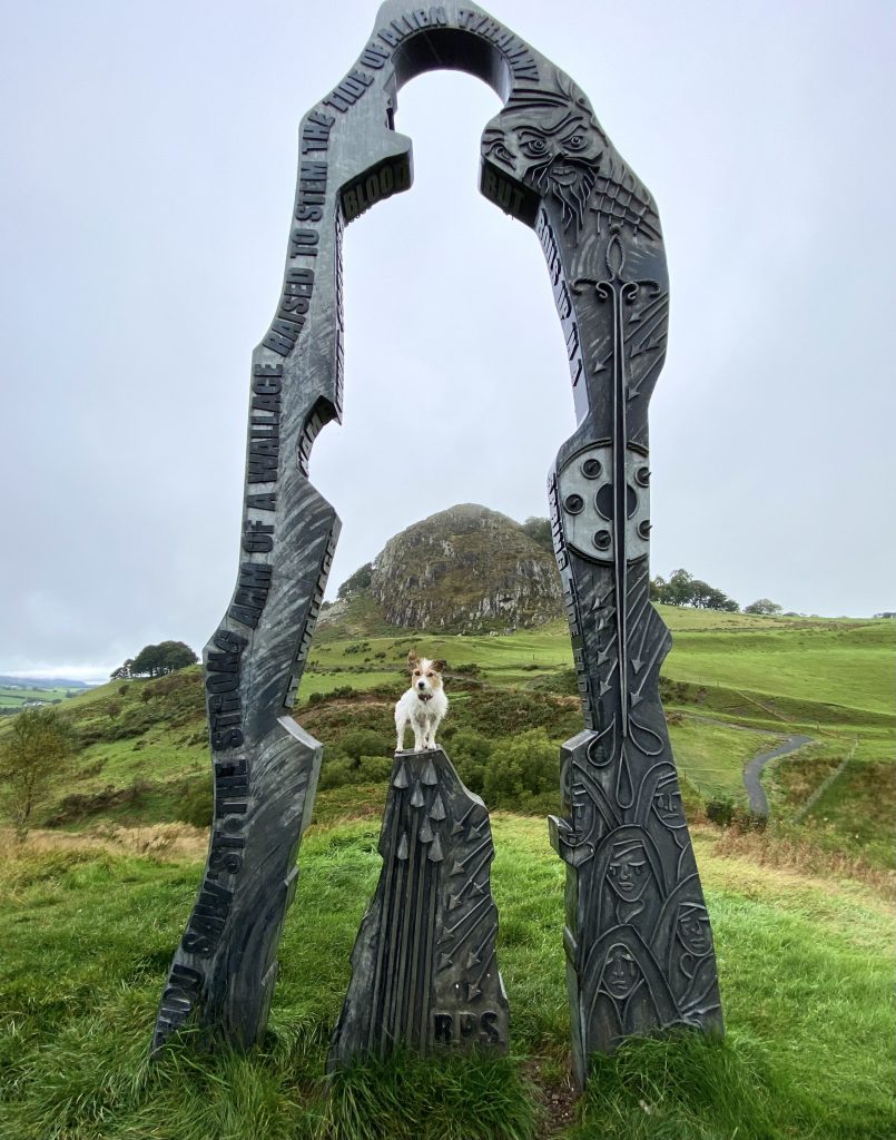 terrier mix on spirit of Scotland sculpture Loudoun hill